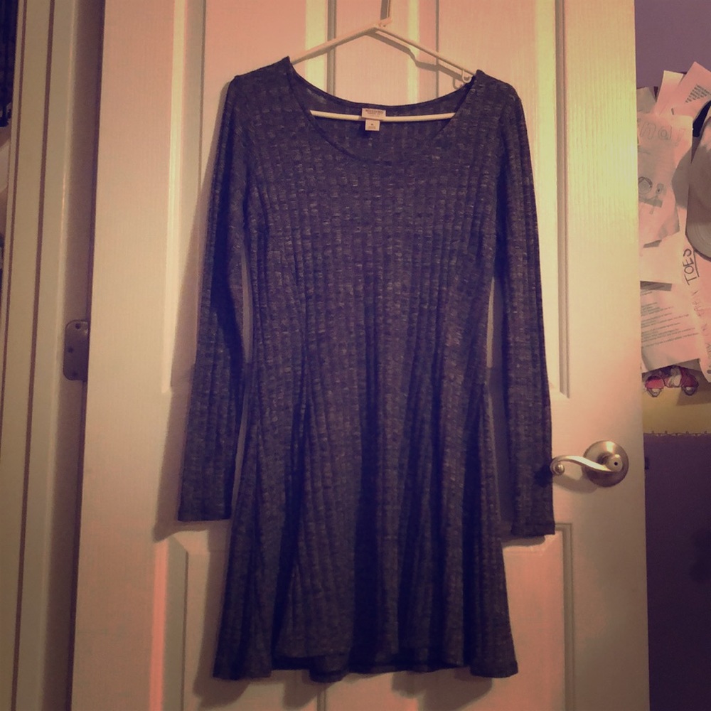 Long sleeve flowing dress.